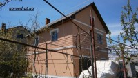 фасад дома фото частных домов штукатурка короед цена