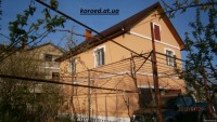 фасад дома фото частных домов штукатурка короед цена