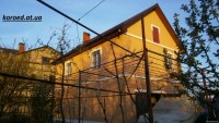 фасад дома фото частных домов штукатурка короед цена