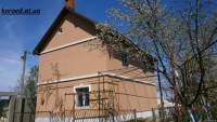 фасад дома фото частных домов штукатурка короед цена