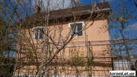 фасад дома фото частных домов штукатурка короед цена