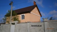 фасад дома фото частных домов штукатурка короед цена